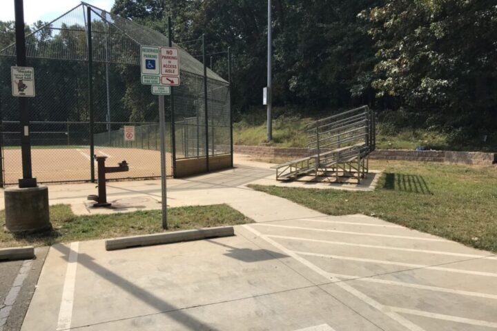 Accessible baseball Field with disabled parking. It has a water fountain and benches.