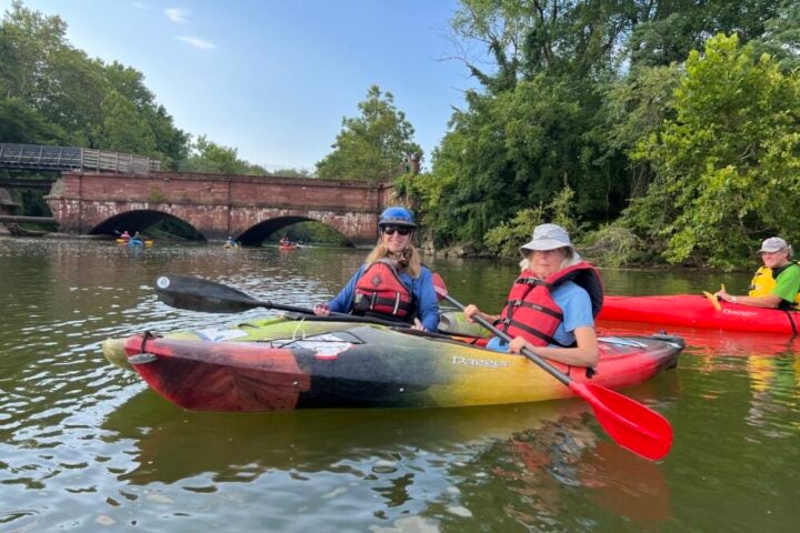 Adaptive Paddling participants paddling on Seneca Creek