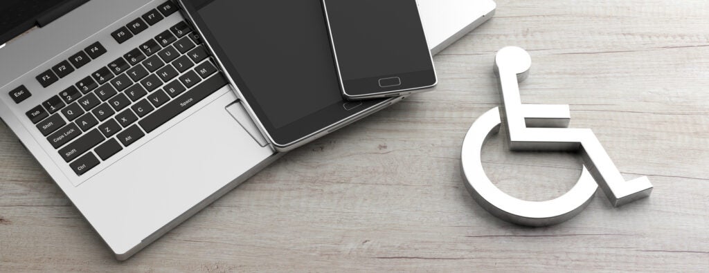 Technology for disabled. Wheelchair disabled sign and electronic devices